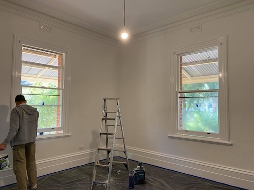 Colourific painter working in mount pleasant